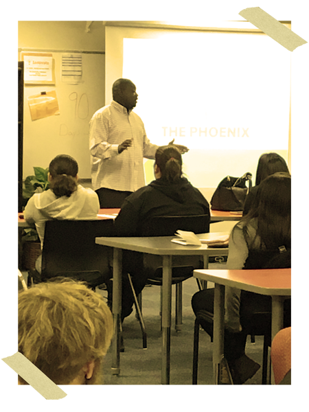 Founder Nate Cooper speaking in front of Students at Phoenix Academy